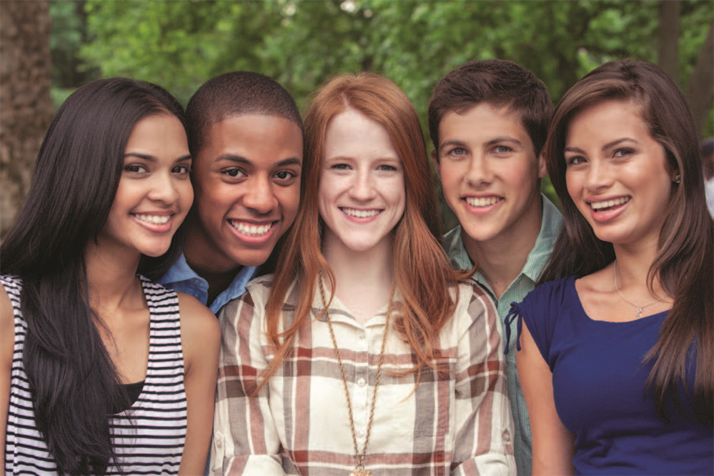  Students standing together smiling